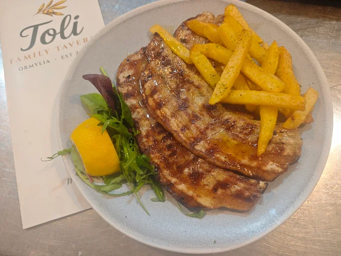 Pork belly strips served at Liana Tavern